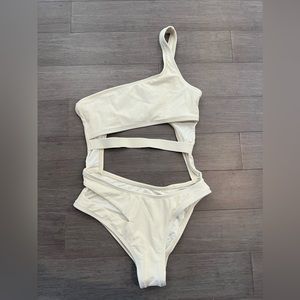 Ris K swimsuit. One piece. Sexy. Cut outs. Size XS. Worn once